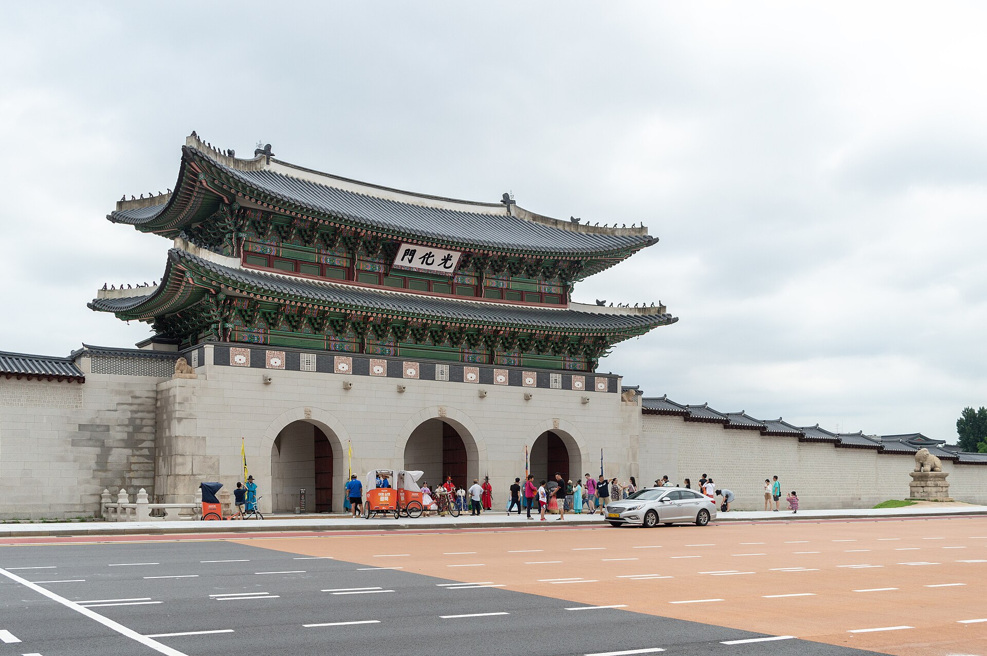 Gwanghwamun, the main gate of Gyeongbokgung Palace, with its two-tiered wooden roof above the stone wall