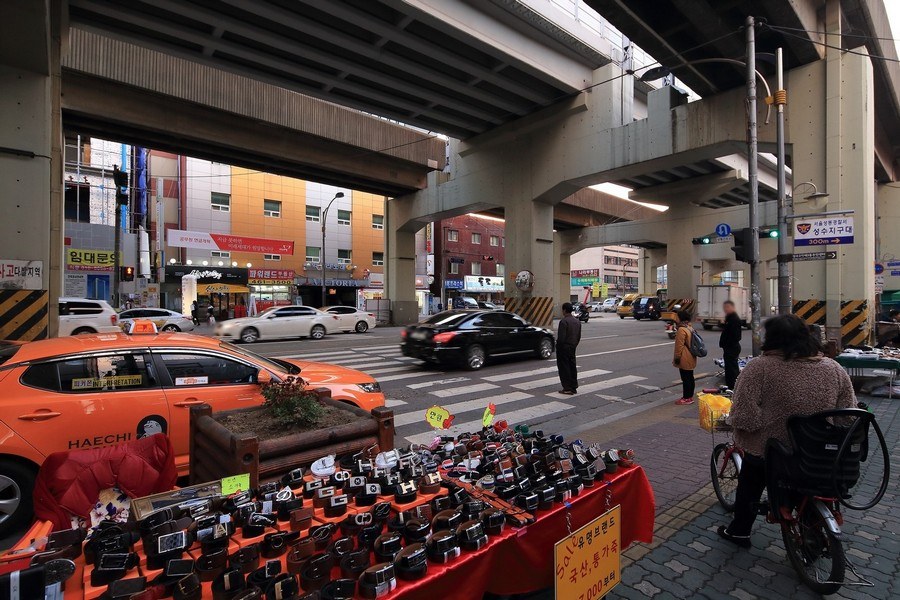 Shoe stalls under the elevated subway line on Achasan-ro near Seongsu Station in 2014