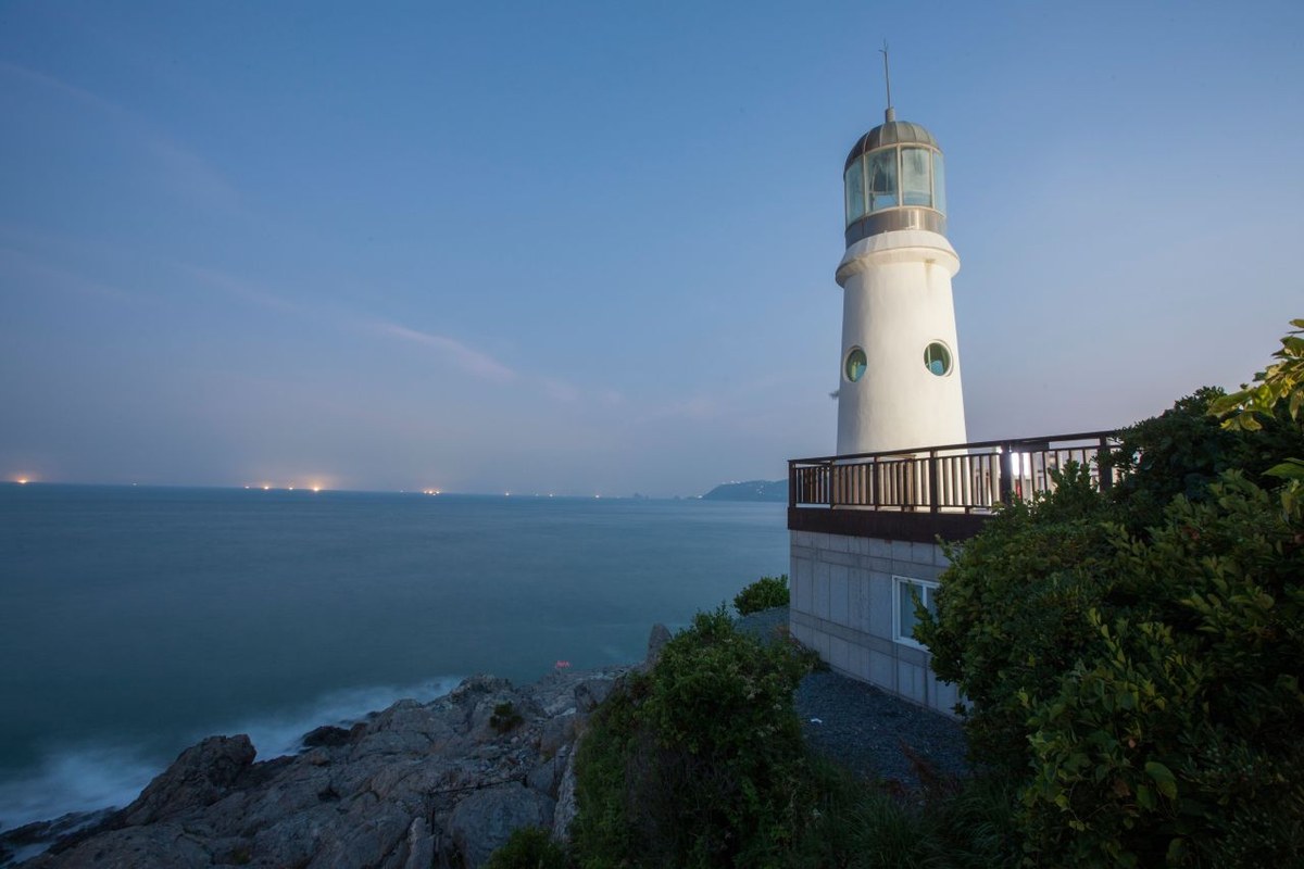 Dongbaekseom island in Haeundae, Busan, with pines and the sea