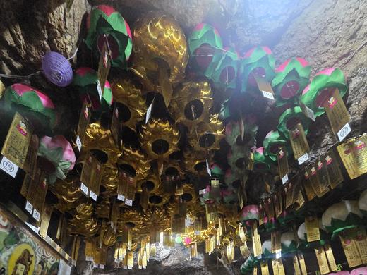 Rows of colorful lotus lanterns hanging inside Geumgang Cave in Seoraksan